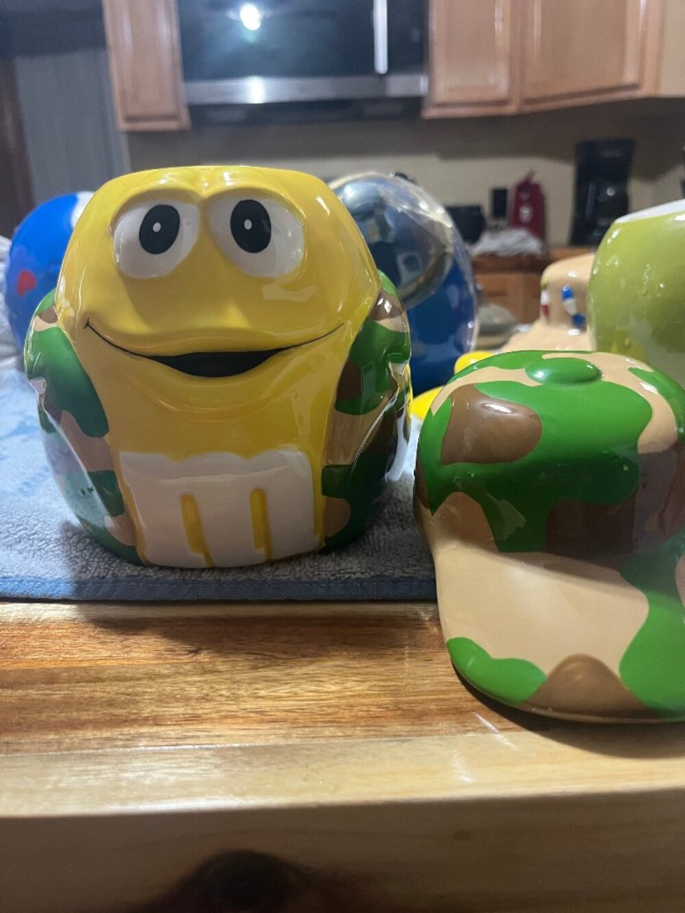 Yellow M&M Ceramic Cookie Jar with Camouflage coat and Hat Lid (2006)